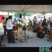 Showing the crowd their musical talents with various instruments.
