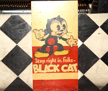 A  Black Cat sign welcomes DC concert goers to come in and enjoy the show.