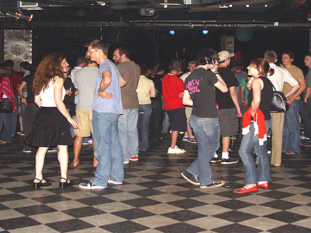 Different groups of people wait in anticipation for the show to start.  The Washington DC area provides a diverse fan base that come together to enjoy the show.