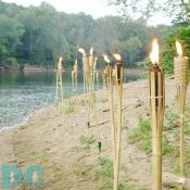 A beacon tike torch line the eastern shore of Little Offutt Island. 