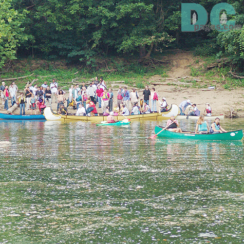 The party attendees wait for the safety boaters to bring them over to Little Offutt Island. 