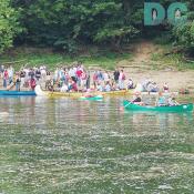 The party attendees wait for the safety boaters to bring them over to Little Offutt Island. 