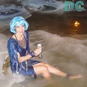 A river spirit lounges in a fog covered lagoon. 
