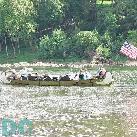 A war canoe brings supplies to the island.