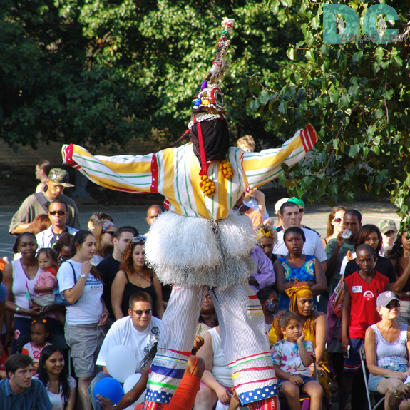 This tall performer stands above the crowd.