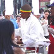 Here, some Jamacian food is served to festival participants.