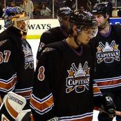 The team discusses some last minute strategy before the opening face-off.
