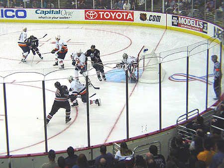 Jaromir Jagr fakes the defender before recording his first goal of the 2003 season only two minutes into the game.