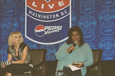 Aretha Franklin explains to the room of reporters what it means to her to sing the National Anthem.