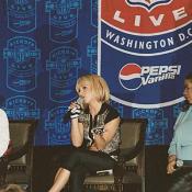 Britney Spears explains to the press that her diamond "B" necklace was just a friendship gift from Madonna.