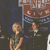 A member of the military who stems from the artists hometown introduced each artist performing at the concert.