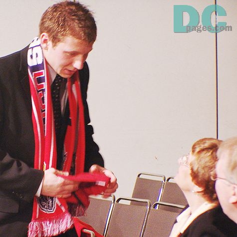 2nd overall pick Brad Guzan spends a moment of celebration with his parents.