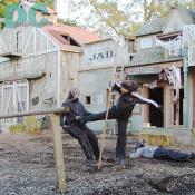 This stunt girl knows how to send ghouls flying with a karate kick.