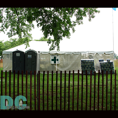 A First Aid Tent in case of medical emergencies.  The most common ailment being dehydation, hence the stacks of bottled water.