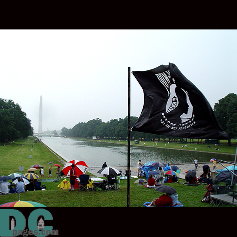 A POW flag in front of the Reflecting Pool provides a constant reminder of our troops.