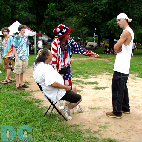 People watch as a psychic tells a young man his destiny.
