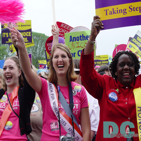 Pink was the color used to show the unity of the those who marched on Washington.  This group of women from NARAL cheer following one of the speakers.