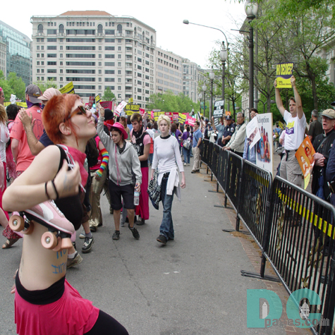 A marcher expresses her statement [written on her body] to the Pro-Life advocates that lined the march route.