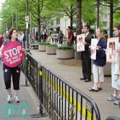 Pro-Life advocates line the march route along Constitution Avenue.