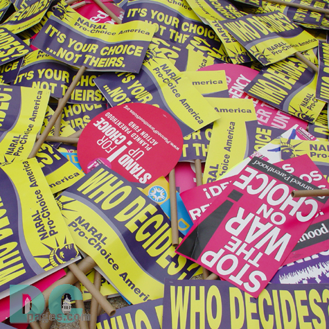 Signs were provided to marchers who did not bring their own.