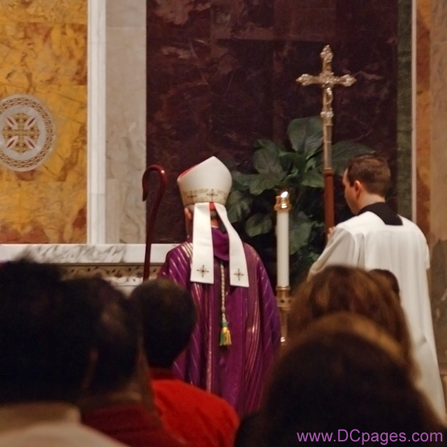 The Archbishop of Washington Enters the high sanctuary.