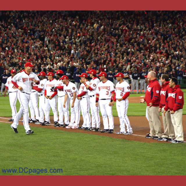 Washington Nationals pitcher Jon Rauch, all 6'11", 285 pounds, has nothing but a smile on his face as the crowd welcomes him to Nationals Park. 