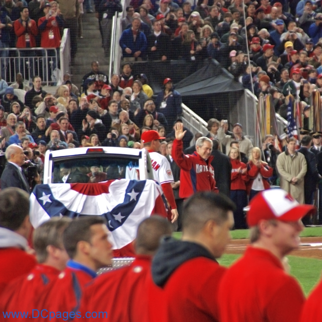 President Bush is announced to the Washington crowd and received a mix of cheers and boo-birds. Many fans were annoyed at the long wait into the stadium that Bush’s presence created.