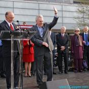 Peter S. Prichard waves to crowd