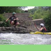 A Calleva staff member training a student on how to use the paddles correctly