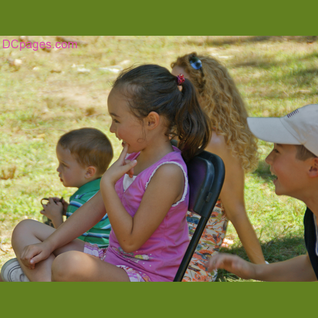 Children Laughing at the Puppet's Antics
