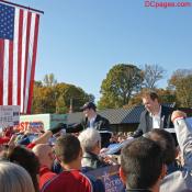 Passing out rally signs.