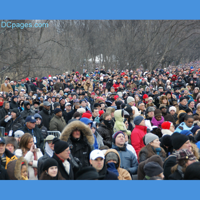 Obama supporters listening intently at Lincoln Memorial
