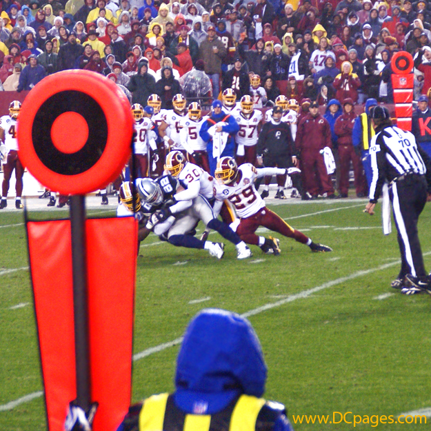 Washington Redskins wrap up a Dallas Cowboy.