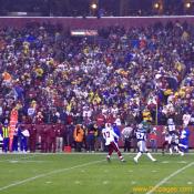 Dallas defender pushes off Washington Receiver to intercept the football.