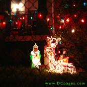 Three Wise Men and a lighted reindeer.