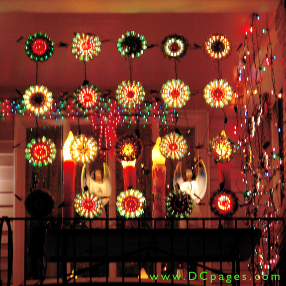 Pulsing lights, angels, and holiday candles are on display.
