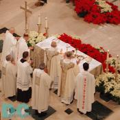 Preparation of the Altar. Most Reverand Gabriel Montalvo, Most Reverand Michael J. Bransfield, and Reverand Monsignor Walter R. Rossi prepare the altar and the gifts, prays over the bread and wine, and helps the assembly get ready for the tremendous Sacrifice that will take place in an unbloody manner. 