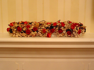 Dried flowers make a festive decorations and brighten up the mantel