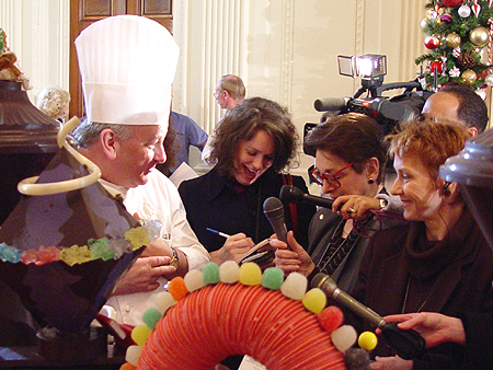 Chef Mesnier answers questions from the press about his creation of the Chocolate Factory.