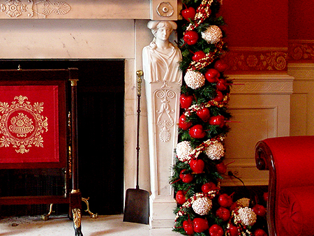 Fireplaces throughout the White House were decorated with garland and balls.