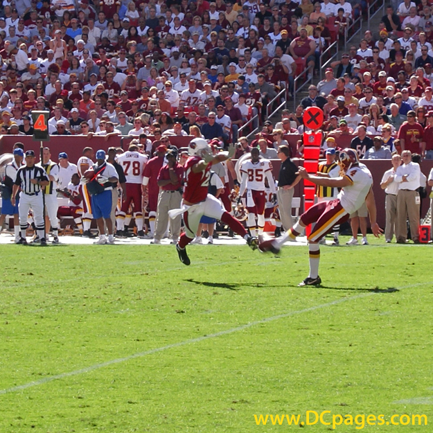 Derrick Frost (4) punt blocked by Matt Ware (22). 