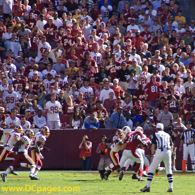 Kurt Warner (13) pass complete to Anquan Boldin (81) 