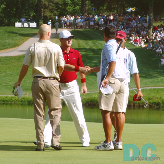 Rory Sabbatini, Ben Crane, and caddies.