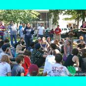Woman giving a speech to protestors during Occupy DC demonstration