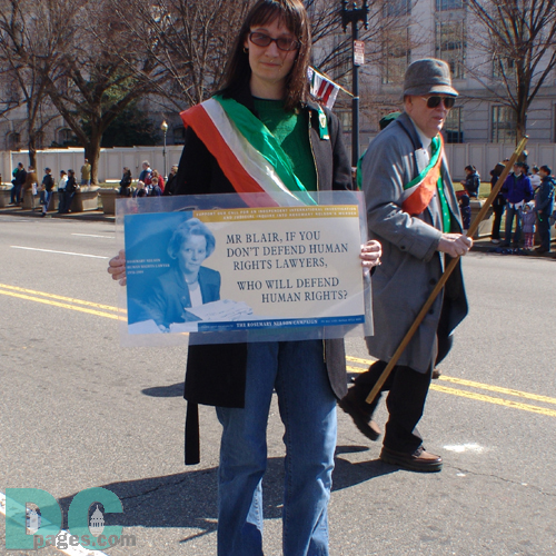 irish girl activist marching in the St Patricks Day Parade had a message for Prime Minister Tony Blair. "Mr Blair, if you don't defend human right lawyers, who will defend human rights?"