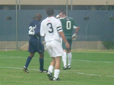 Hoya Dan Gargan watches goalkeeper Tim Hogan stop the Bison from scoring.