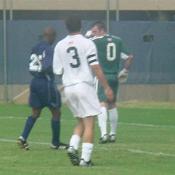 Hoya Dan Gargan watches goalkeeper Tim Hogan stop the Bison from scoring.