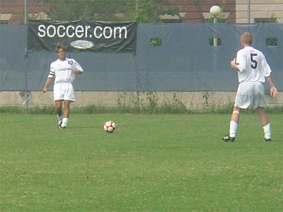 Hoya Jeff Curtin passes the ball to his teammate.