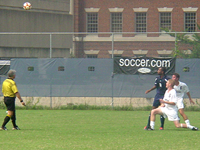The Hoyas and the Bison fight over who will be able to "head" the ball.