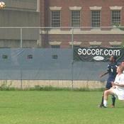 The Hoyas and the Bison fight over who will be able to "head" the ball.